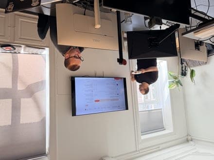 Propane team in the office with Product Hunt on screen